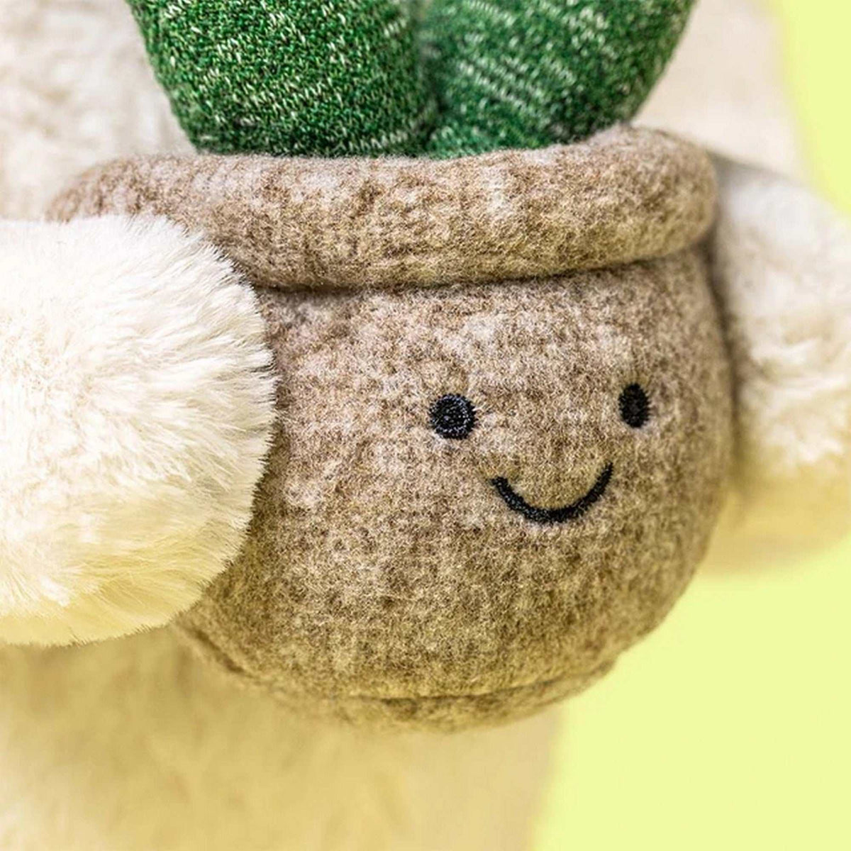 Hase mit Pflanze