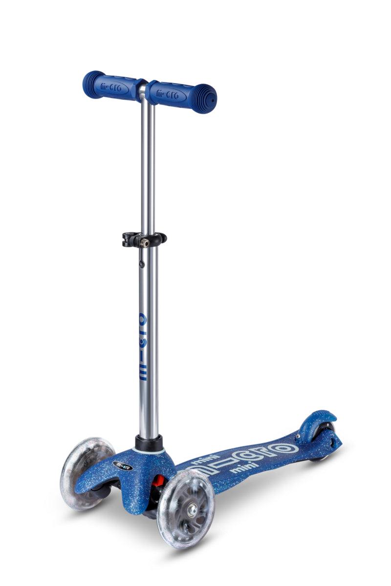 Mini Micro Deluxe Galaxy Glitter LED Scooter with navy glitter deck and glowing LED wheels for kids 2-5 years