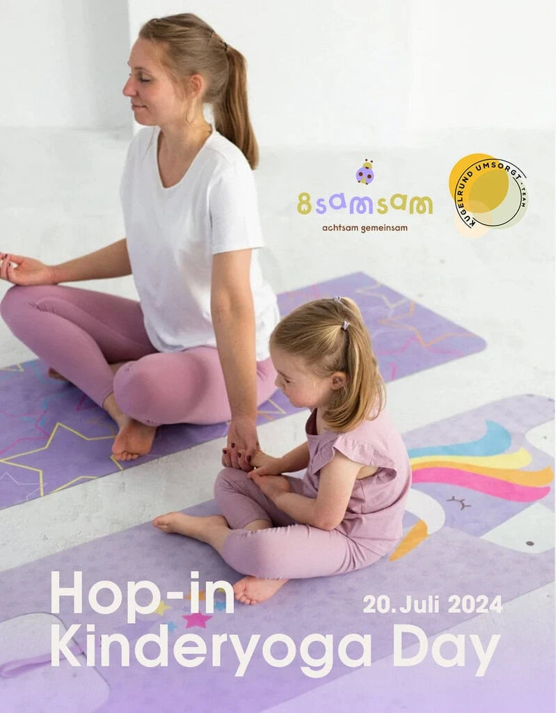 Mother and daughter practicing yoga together on colorful YOGITIER mats for Hop-in Kinderyoga Day event in Stuttgart 2024