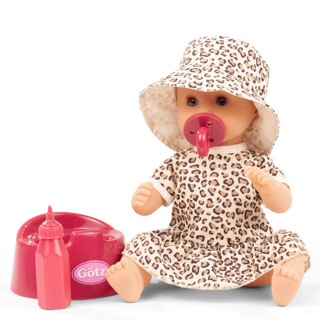Sleepy Aquini Puppe mit braunen Schlafaugen im Leo-Look mit Schnuller, Flasche und Töpfchen in kräftigem Pink