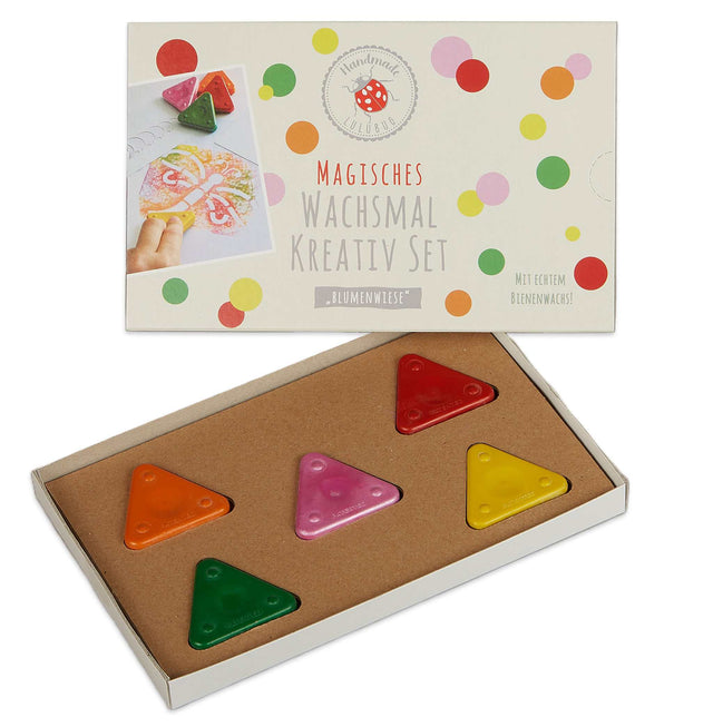 Magisches Wachsmal-Kreativ Set mit bunten Wachsmal-Dreiecken und Schablonen für kreative Kinderkunst